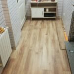 Salón reformado con suelo de tarima flotante, reforma integral en Ciudad Real